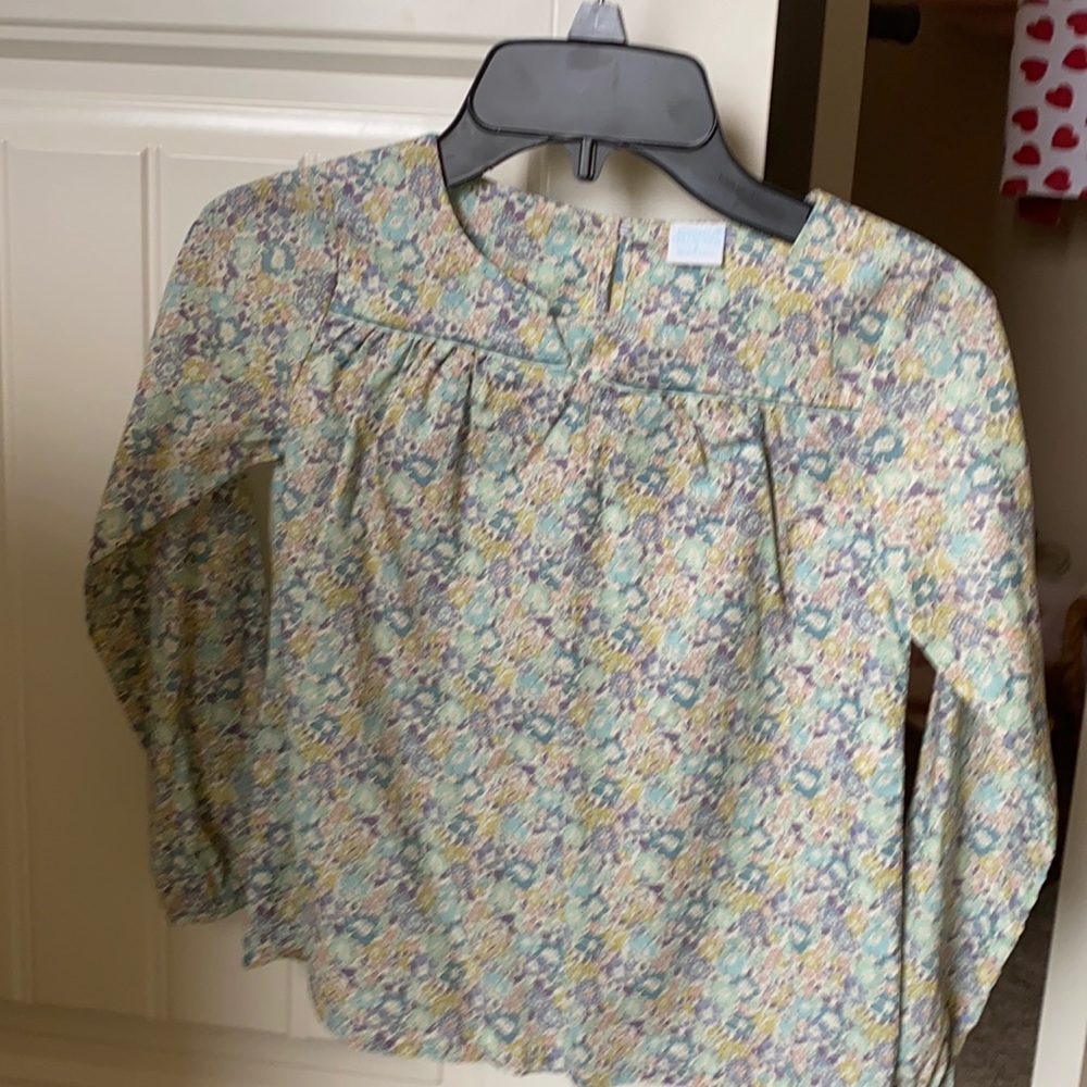 Little girls cute shirt. New condition and comes from pet/smoke free home.
